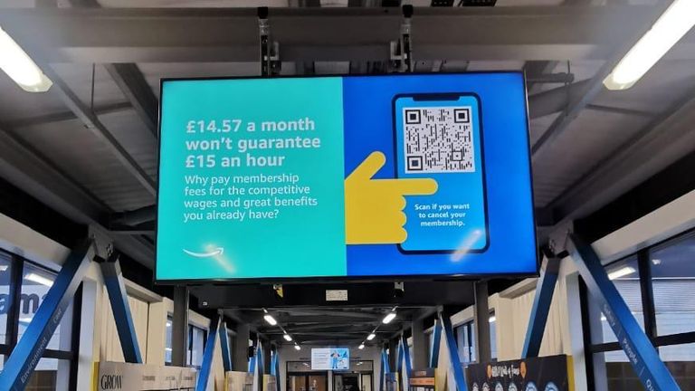 Message displayed at Amazon's Coventry site saying membership won't guarantee improved pay. 