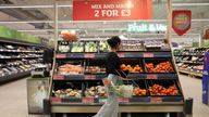 A customer shops in the fruit aisle inside a Sainsbury?s supermarket, in Richmond, West London, Britain February 21, 2024. REUTERS/Isabel Infantes