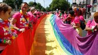 Parade flag bearers prepare to lift a giant rainbow flag ahead of the the Pride March in London.
Pic: EPA/Shutterstock