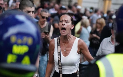 Over 100 arrests in London after flares thrown at Downing Street gates as unrest breaks out across UK over Southport attack