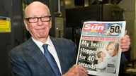 BROXBOURNE, UNITED KINGDOM - FEBRUARY 25:  (EDITORS NOTE: THIS IMAGE IS FREE FOR USE UNTIL MARCH 3 2012)  In this handout photograph provided by News International, Rupert Murdoch, Chairman and CEO of News Corporation, reviews the first edition of The Sun On Sunday as it comes off the presses on February 25, 2012 in Broxbourne, England. Around 3 million copies of 'The Sun On Sunday', the first ever Sunday edition of News International's daily tabloid newspaper 'The Sun', are due to go on sale on Sunday February 26, 2012.  (Picture Arthur Edwards/News International via Getty Images)