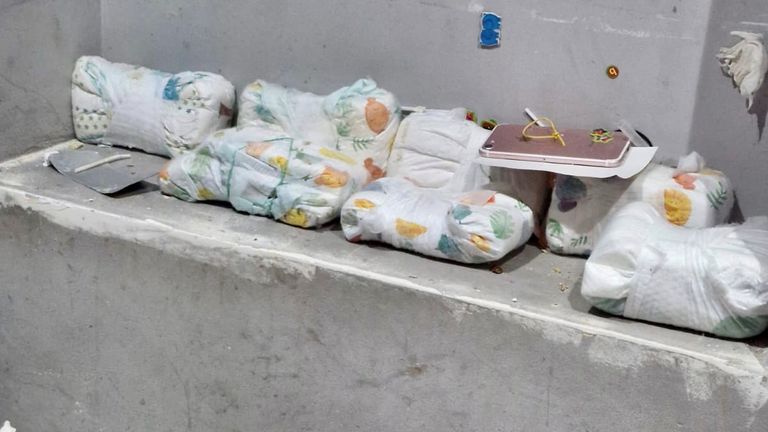 Huge amounts of cash was found stashed in nappies. Pic: PA