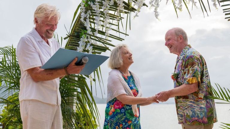 Sir Alan smiles as he looks at Richard Branson during the ceremony