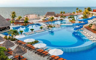 Relax in the sun or enjoy family fun on a beachside getaway in Cancun