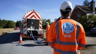 File photo dated 10/08/22 of workers from Thames Water delivering a temporary water supply from a tanker, as ministers have continued efforts to reassure Thames Water customers that their supplies would not be affected as a result of the financial troubles faced by the firm.