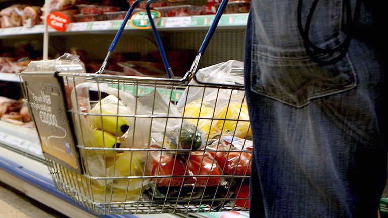 Undated file photo of a person holding a shopping basket in a supermarket. Figures from analysts Kantar show that consumers have cut their supermarket shopping due to the unseasonable weather, even as grocery price inflation fell for the 16th month in a row, with take-home grocery sales have rising by just 1% over the month, the slowest increase since June 2022. Issue date: Tuesday June 18, 2024.