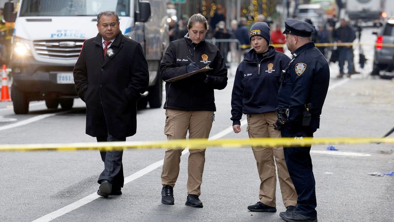 Police officers work near the scene where the CEO of United Healthcare Brian Thompson was reportedly shot and killed.
Pic: Reuters