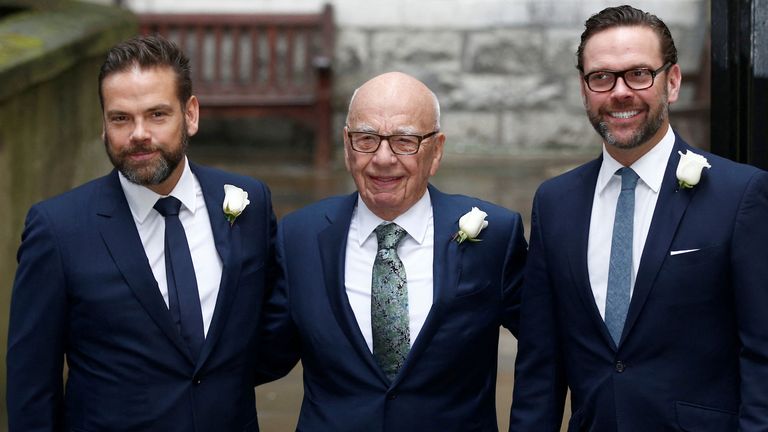 FILE PHOTO: Media Mogul Rupert Murdoch (C) poses for a photograph with his sons Lachlan (L) and James as they arrive at St Bride's church for a service to celebrate the wedding between Murdoch and former supermodel Jerry Hall which took place on Friday, in London, Britain March 5, 2016. REUTERS/Peter Nicholls/File Photo