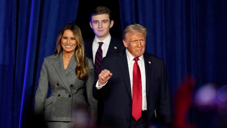 Donald Trump, Melania and Barron arrive at an election night watch party.
Pic: AP