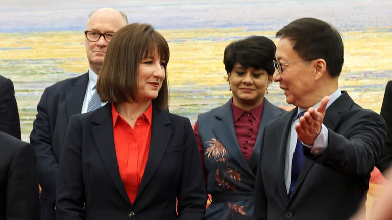 Chinese Vice President Han Zheng gestures to Britain's Chancellor of the Exchequer Rachel Reeves following a photo session at the Great Hall of the People in Beijing, Saturday, Jan. 11, 2025. (Florence Lo/Pool Photo via AP)