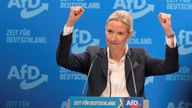 Alice Weidel punches the air after being elected as her party's candidate for chancellor.
Pic: Reuters/Matthias Rietschel