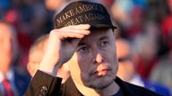 FILE - Tesla and SpaceX CEO Elon Musk listens as Republican presidential nominee former President Donald Trump speaks at a campaign event at the Butler Farm Show, on Oct. 5, 2024, in Butler, Pa. (AP Photo/Alex Brandon, File)