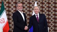 Russian President Vladimir Putin, right, and Iranian President Masoud Pezeshkian shake hands during a meeting in Turkmenistan last year. Pic: AP