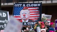 Demonstrators protest President-elect Donald Trump's incoming administration during the People's March, Saturday, Jan. 18, 2025, in Washington. (AP Photo/Jose Luis Magana)