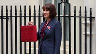 Britain's Chancellor of the Exchequer Rachel Reeves poses with the red budget box outside her office on Downing Street in London, Britain October 30, 2024. REUTERS/Mina Kim