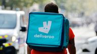 FILE PHOTO: A delivery worker with a backpack of Deliveroo rides a bike in Nice, France, October 25, 2022. REUTERS/Eric Gaillard/File Photo