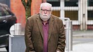 Former Co-op Bank boss Paul Flowers arrives at Manchester Magistrates' Court where he is accused of fraud by abusing his position