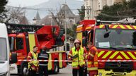 French firefighters and rescue forces stand near the entrance of the Russian consulate in Marseille after the consul general confirmed there had been an explosion, in Marseille, France, February 24, 2025. REUTERS/Stringer