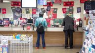 People inside a branch of the Post Office in Paddington.
Pic: PA