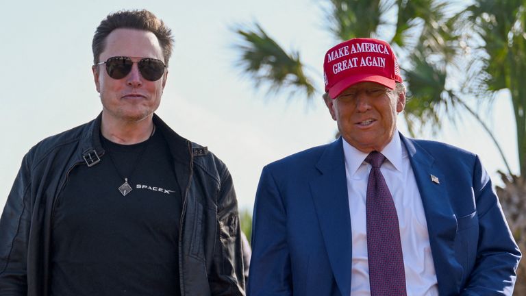 Donald Trump walks with Elon Musk before attending a viewing of the launch of the sixth test flight of the SpaceX Starship rocket, in Brownsville, Texas, U.S., November 19, 2024 . Brandon Bell/Pool via REUTERS TPX IMAGES OF THE DAY